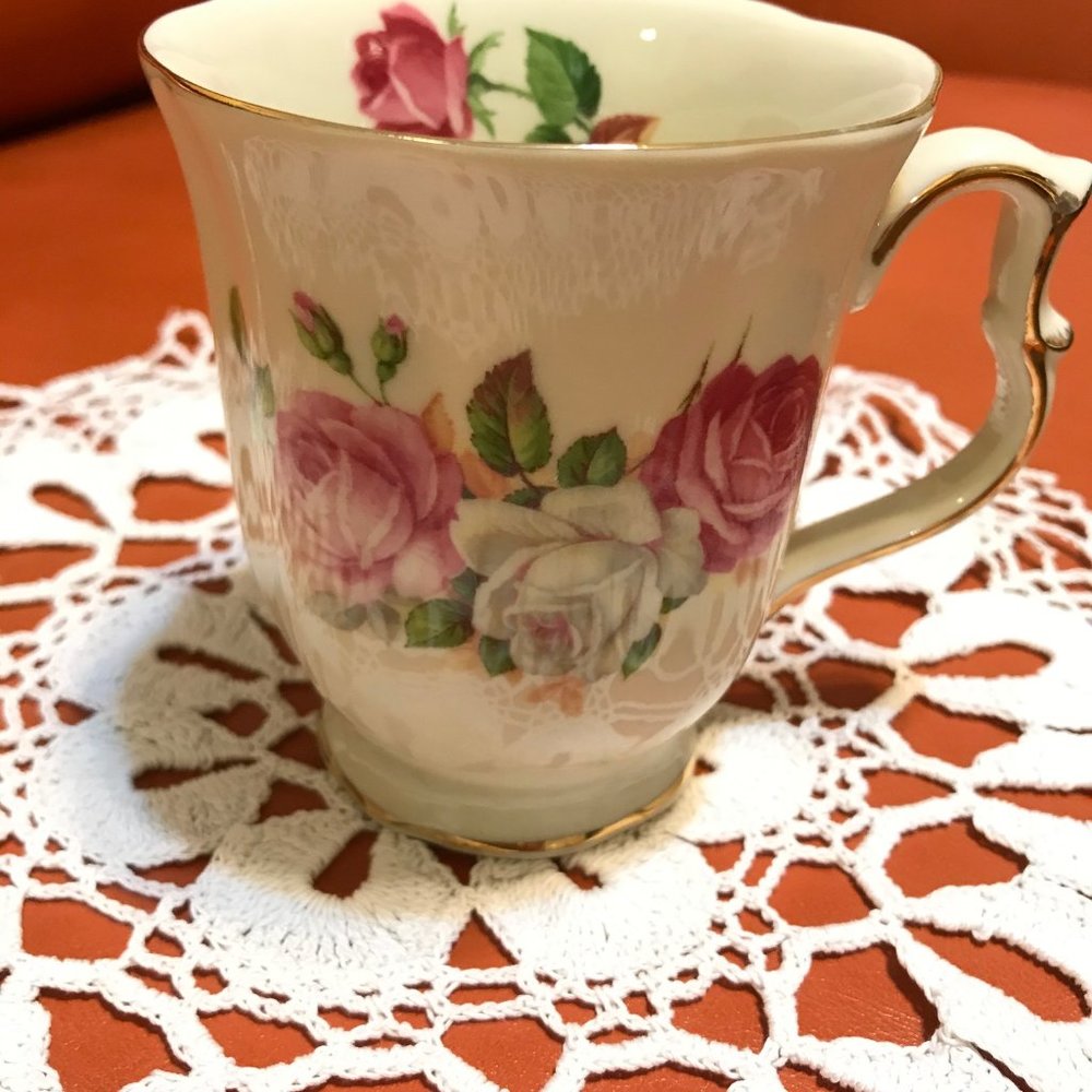 Vintage Hand Made Crochet Doily and a Tea Mug.